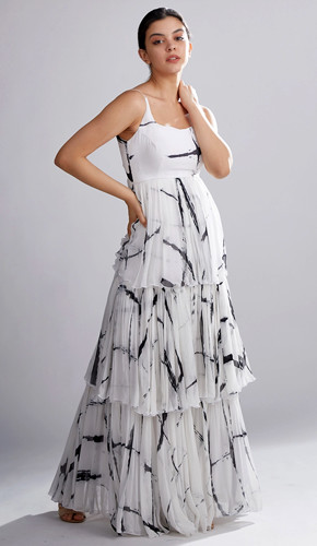 Shibori tie-dye white maxi dress with layered flare styling.