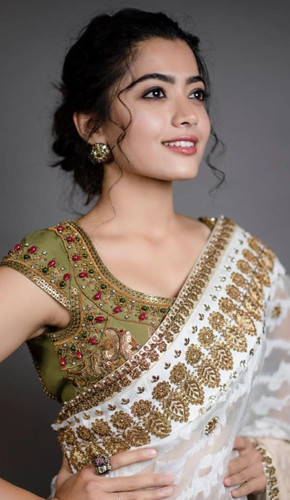 Pin by Ponchoma on Flower bun idea  Most beautiful bollywood actress Saree  hairstyles Saree look