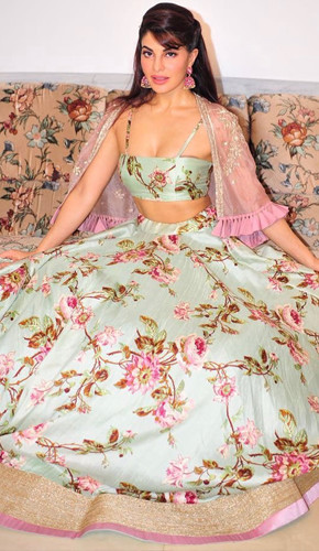 Anushree reddy's mint green floral lehenga is a fashion statement. the floral design, strappy blouse, and tasseled dupatta create a modern and elegant look