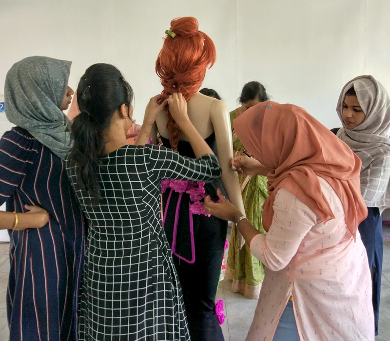 Mannequin Draping Activity by Team Faddy Girls at Waves Institute of Fashion Designing