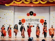 Students of Providence Women's College, Kozhikode (Calicut), on stage for their Fashion Show event
