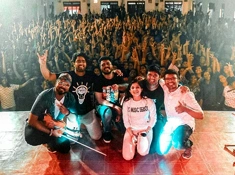 Student enjoying the musical band performance at Providence Women's College, Calicut